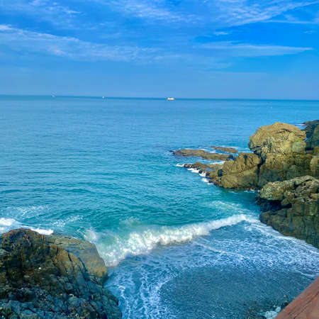 Beautiful seascape with blue sky and white clouds on a sunny dayの写真素材