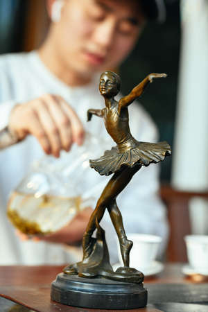 Barista making coffee in a coffee shop. Selective focus.の写真素材