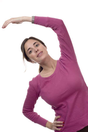 Caucasian woman doing exercise. Photographed in studio.の写真素材
