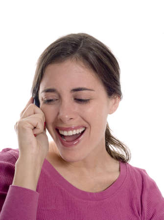 A Caucasian woman talks on her cel phone.の写真素材