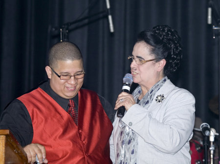 Bronx, NY - April 9: Pentecostal Christian singers Hector Delgado and Carmen Sanabria sing during Christian concert held at Lehman High School. Taken April 9th, 2011 in the County of the Bronx, NY.のeditorial素材
