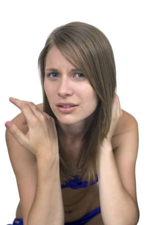 Girl against plain white background.  She was 19 at the time of shoot and was photographed in studio.  の写真素材