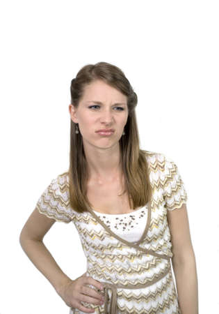 Studio image of girl with unhappy expression. の写真素材