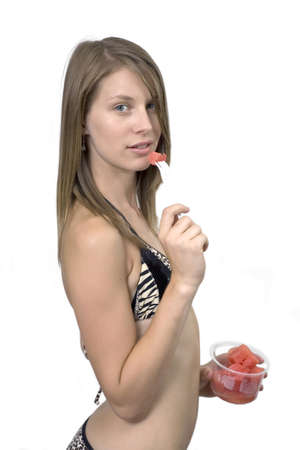Girl against plain white background.  She was 19 at the time of shoot and was photographed in studio.  の写真素材