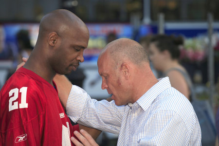 New York, NY - August 23: Rev. Shawn Holes "on right" prays with another man as he does his open air preaching on Union Square.  Taken August 23rd, 2008 in New York City. のeditorial素材