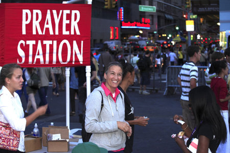 New York, NY - August 23: Wife of Rev. Shawn Holes "shown here" assists during open air preaching event in Union Square.  Taken August 23rd, 2008 in New York City. のeditorial素材