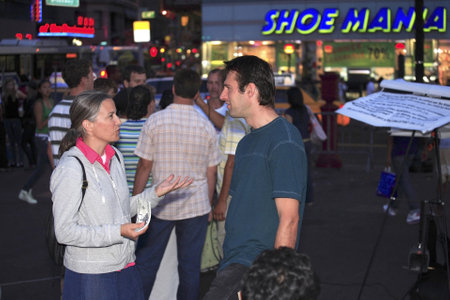 New York, NY - August 23: Wife of Rev. Shawn Holes "on left" and a friend help during open air preaching on Union Square.  Taken August 23rd, 2008 in New York City. のeditorial素材
