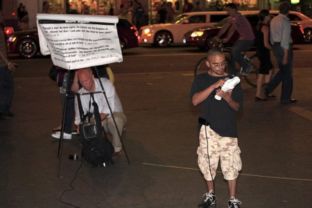 New York, NY - August 23: Rev. Shawn Holes "rear" does open air preaching on Union Square while friend "front" assists.  Taken August 23rd, 2008 in New York City. のeditorial素材