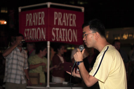 New York, NY - August 23: A Korean friend "shown here" assists Rev. Shawn Holes during open air preaching on Union Square.  Taken August 23rd, 2008 in New York City. のeditorial素材
