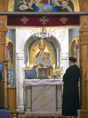  Fr. Mina Kamel Yanni performs holy services during Vespers prayer night at the Coptic Orthodox Church of St George in Brooklyn NY.    Photographed September 2009 in the USA.  のeditorial素材