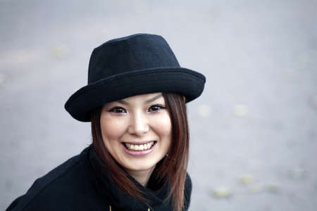 Fashion model poses in Central Park New York.  She was 23 at the time of shoot and of Japanese ethnicity.  Photographed November, 2007.            の写真素材