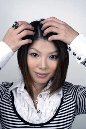 She is Japanese and was in her early twenties at the time of shoot. Photographed December, 2007, USA. She is Japanese and was in her early twenties at the time of shoot. Photographed December, 2007, USA.