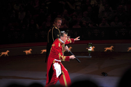 NEW YORK, NEW YORK - NOVEMBER 15: Clowns perform balancing act during comedy routine at Big Apple Circus show.  Taken November 15, 2007 in New York City.のeditorial素材