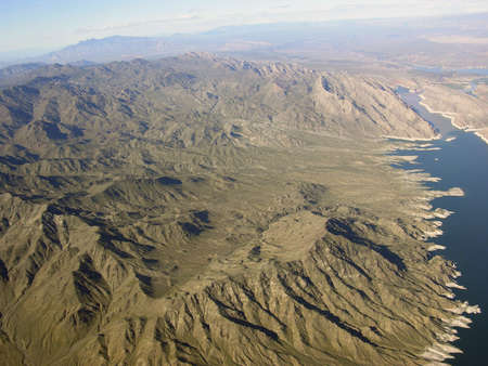 Aerial view of Lake Mead which is located  in the states of Nevada and Arizona. Formed by water impounded by the Hoover Dam.  の写真素材