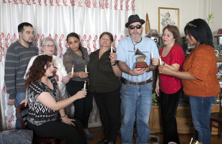 BRONX, NEW YORK - DECEMBER 23: Yomo Toro's family unites to remember and pray for international cuatro player Yomo Toro who was awarded the Grammy but passed away before he could accept it. Taken December 23, 2012 in the Bronx, NY.のeditorial素材