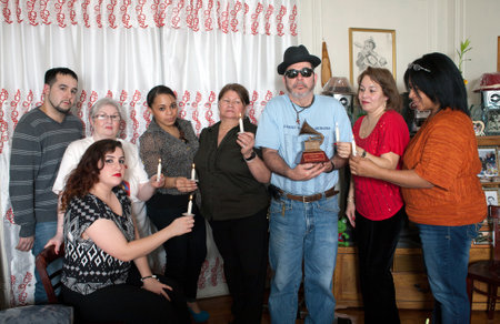 BRONX, NEW YORK - DECEMBER 23: Yomo Toro's family unites to remember international cuatro player Yomo Toro who was awarded the Grammy but passed away before he could accept it. Taken December 23, 2012 in the Bronx, NY.のeditorial素材