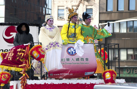 NEW YORK, NEW YORK - FEBRUARY 17: People wearing traditional Chinese costumes during Chinese New Year parade held in Chinatown.   Taken February 17, 2013 in NYC. のeditorial素材