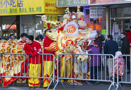 NEW YORK, NEW YORK - FEBRUARY 17: Workers put away dragon costume after the Chinese New Year parade.   Taken FEBRUARY 17, 2013 in  NYC.のeditorial素材