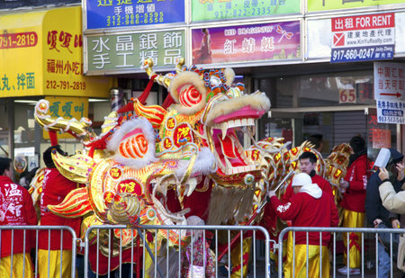 NEW YORK, NEW YORK - FEBRUARY 17: Workers put away dragon costume after the Chinese New Year parade.   Taken FEBRUARY 17, 2013 in  NYC.のeditorial素材
