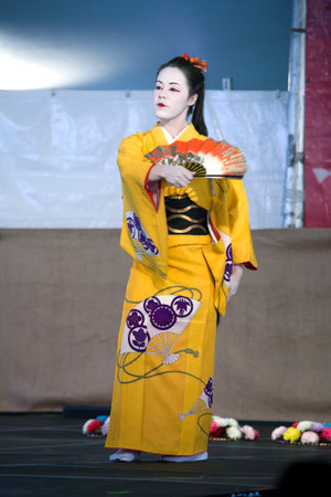 BROOKLYN, NEW YORK - APRIL 28: Sachiyo Ito Dance Company woman performs at Brooklyn Botanic Garden during Cherry Blossom Festival.   Taken April 28, 2013 in Brooklyn,  New York.のeditorial素材