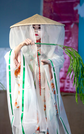 BROOKLYN, NEW YORK - APRIL 28: Sachiyo Ito Dance Company woman performs at Brooklyn Botanic Garden during Cherry Blossom Festival.   Taken April 28, 2013 in Brooklyn,  New York.のeditorial素材