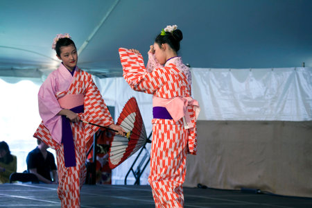 BROOKLYN, NEW YORK - APRIL 28: Sachiyo Ito Dance Company women perform at Brooklyn Botanic Garden during Cherry Blossom Festival.   Taken April 28, 2013 in Brooklyn,  New York.のeditorial素材