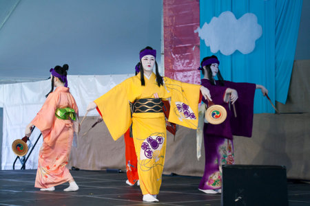 BROOKLYN, NEW YORK - APRIL 28: Sachiyo Ito Dance Company women perform at Brooklyn Botanic Garden during Cherry Blossom Festival.   Taken April 28, 2013 in Brooklyn,  New York.のeditorial素材