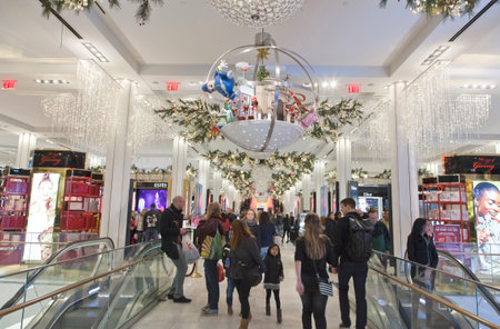 NEW YORK, NEW YORK, USA - DECEMBER 10: Shoppers visit Macy's department store in Herald Square and 34th street.  Taken December 10, 2015 in NY.のeditorial素材