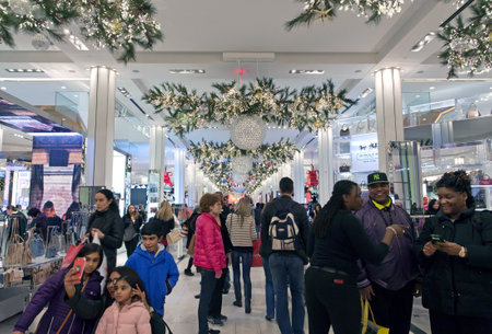 NEW YORK, NEW YORK, USA - DECEMBER 10: Shoppers visit Macy's department store in Herald Square and 34th street.  Taken December 10, 2015 in NY.のeditorial素材