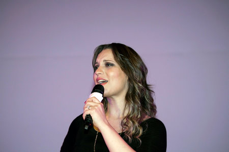BRONX, NEW YORK - SEPTEMBER 9: Female singer Christine D' Clario performs during a Christian concert for Realizing Possibilities ministry.  Taken September 9, 2012 in  New York.のeditorial素材