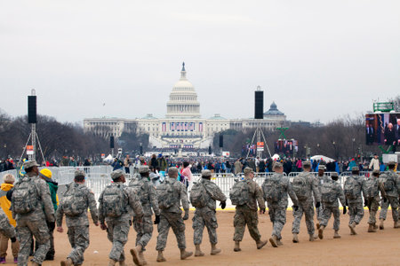 WASHINGTON, DC - JANUARY 20: Soldiers walk in front of Capitol building during Inauguration of Donald Trump.  Taken January 20, 2017 in District of Columbia.のeditorial素材