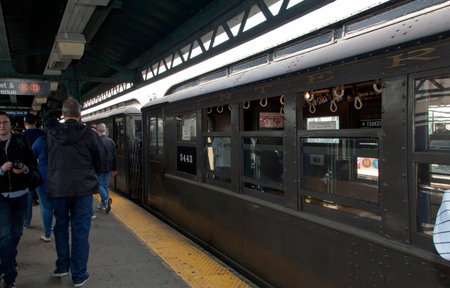 BRONX, NEW YORK, USA - APRIL 10:  A vintage Low Voltage train from the early 1900's  stops at Yankee Stadium for opening day game.  Taken April 10, 2017 in New York.のeditorial素材