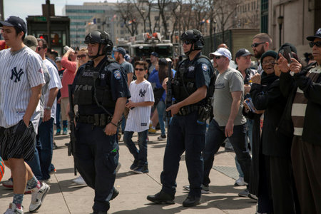 BRONX, NEW YORK, USA - APRIL 10:  NYPD Police Counter terrorism Bureau officers patrol Yankee stadium during opening day game.  Taken April 10, 2017 in New York.のeditorial素材