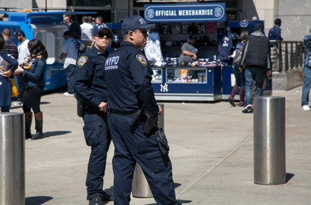 BRONX, NEW YORK, USA - APRIL 10:  NYPD Police Counter terrorism Bureau officers patrol Yankee stadium during opening day game.  Taken April 10, 2017 in New York.のeditorial素材