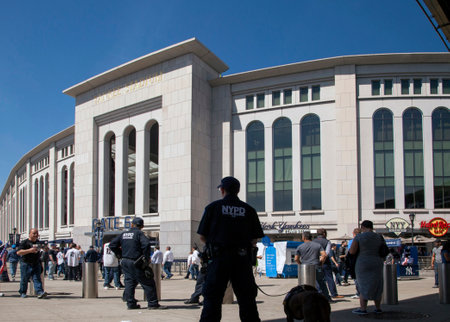 BRONX, NEW YORK, USA - APRIL 10: NYPD and fans at Yankee Stadium for opeing game.  Taken April 10, 2017 in New York.のeditorial素材