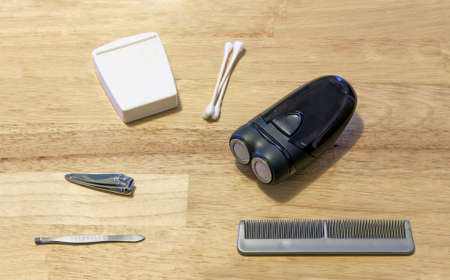 Several grooming items on a wooden tableの写真素材