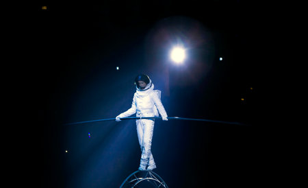 BROOKLYN, NEW YORK - FEBRUARY 25: Laszlo Simet dressed as astronaut  balances on Simet wheel at...