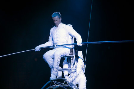 BROOKLYN, NEW YORK - FEBRUARY 25: Lazslo Simet and partner dressed as astronaut  balancing on Simet wheel at Barclays during Ringling Bros Barnun Baley Circus.  Taken February 25, 2017 in New York.のeditorial素材