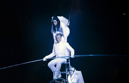 BROOKLYN, NEW YORK - FEBRUARY 25: Laszlo Simet, his partner and wife below dressed as astronauts  balance on Simet wheel at Barclays during Ringling Bros Barnun Baley Circus.  Taken February 25, 2017 in New York.のeditorial素材