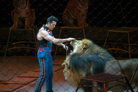 BROOKLYN, NEW YORK - MARCH 3: Alexander Lacey performs with lions during Ringling Bros show.  Taken March 3, 2017 in New York.のeditorial素材