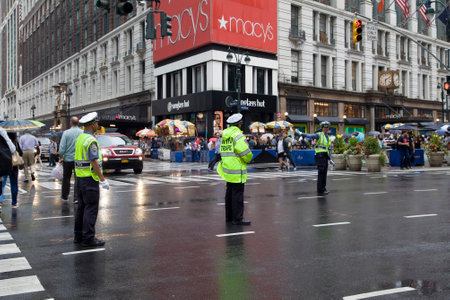 NEW YORK, NEW YORK/USA - July 22, 2019: Traffic officers direct traffic on intersection of 34th...