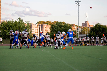 BRONX, NEW YORK/USA - August 10, 2019: Football teams play a game in park near Yankee Stadium.のeditorial素材