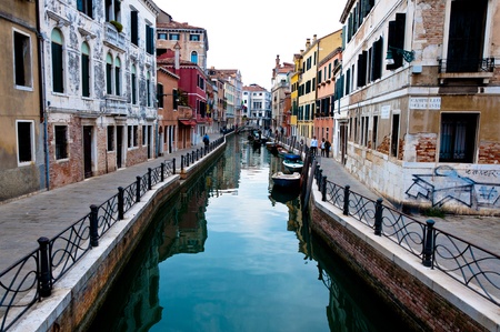 typical urban view with canal, boats and houses in Venice - Italyのeditorial素材