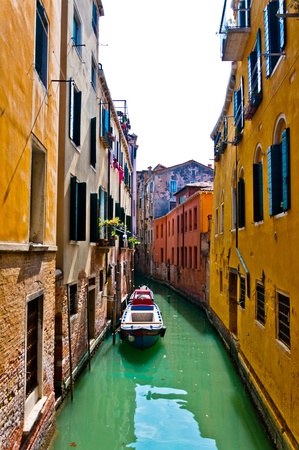 Venice, Italy - canal, boats and housesの写真素材