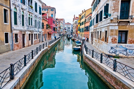 Venice, Italy - canal, boats and housesの写真素材