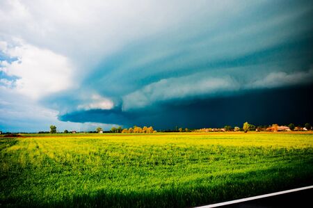 dramatic landscape with arriving storm in Po valley, Emiliaの写真素材