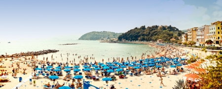 JUNE 2012  Tourists rest on Venere Azzurra Beach awarded with the prestigious Blue Flag and enjoy the sea in a hot day on June 03, 2012 in Lerici のeditorial素材