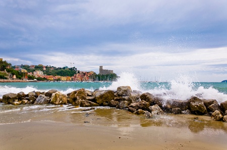 Lerici in Liguria with waves crashing on rocksの写真素材