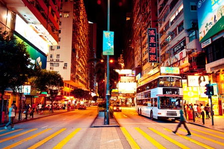 Hong Kong S.A.R., China - July 30, 2012: Neon signs on Nathan Road in Kowloon, Hong Kong on July 30, 2012. Nathan Road is the main thoroughfare in Kowloon, and goes from Tsim Sha Tsui to Mong Kok. It is lined with shops, restaurants and tourists.のeditorial素材
