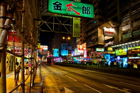 Hong Kong S.A.R., China - August 02, 2012: signs, people and taxis at night on Nathan Road in Kowloon, Hong Kongのeditorial素材